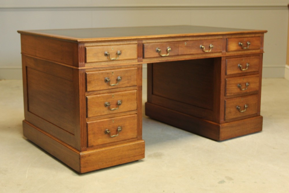 A Large mahogany kneehole writing desk. View II