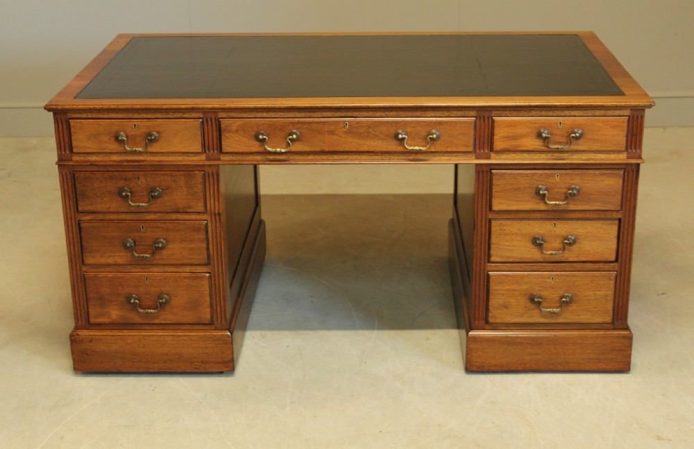A Large mahogany kneehole writing desk. View III