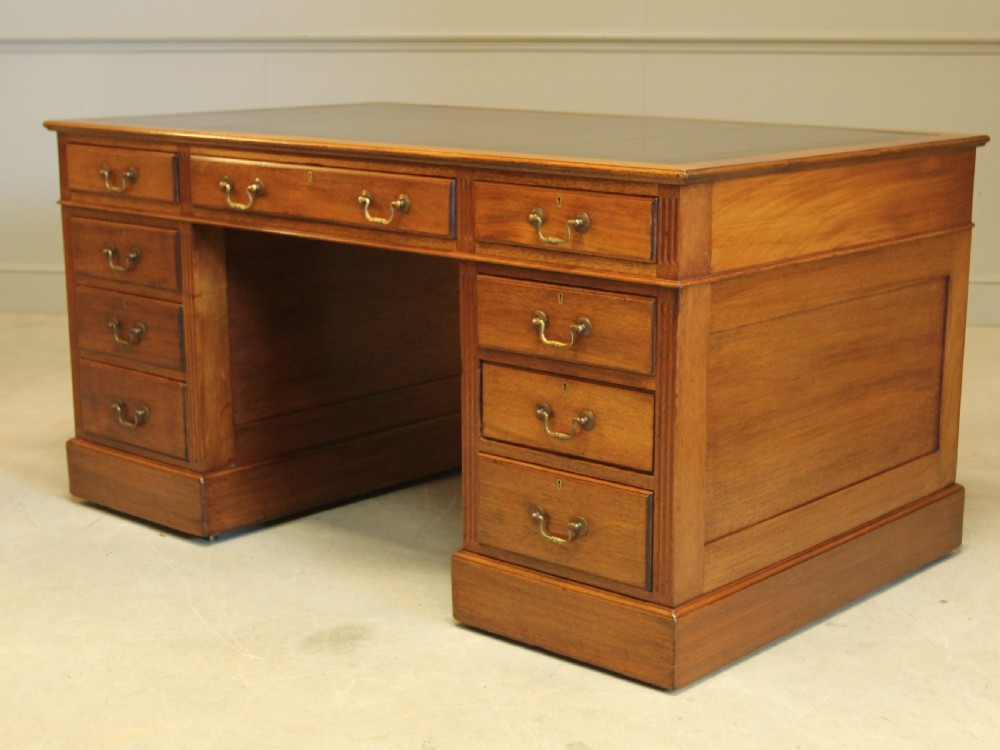 A Large mahogany kneehole writing desk. View VII