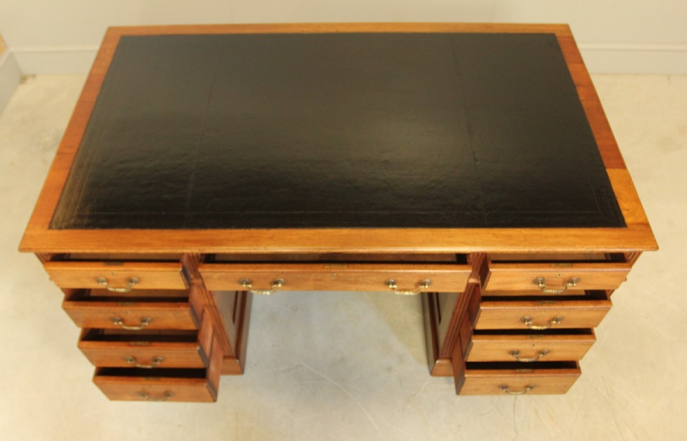 A Large mahogany kneehole writing desk. View IX