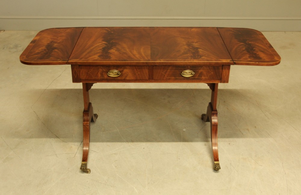 A 19th century curl mahogany sofa table View IV