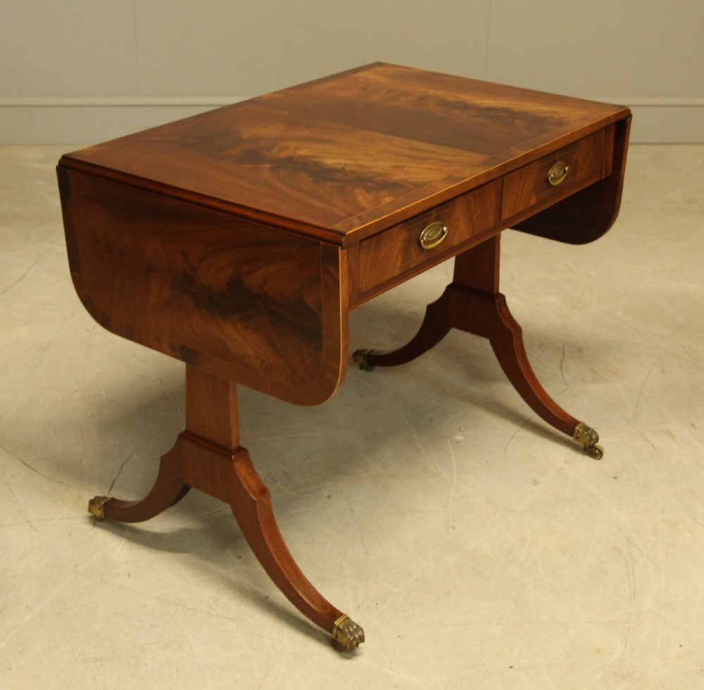 A 19th century curl mahogany sofa table View VI