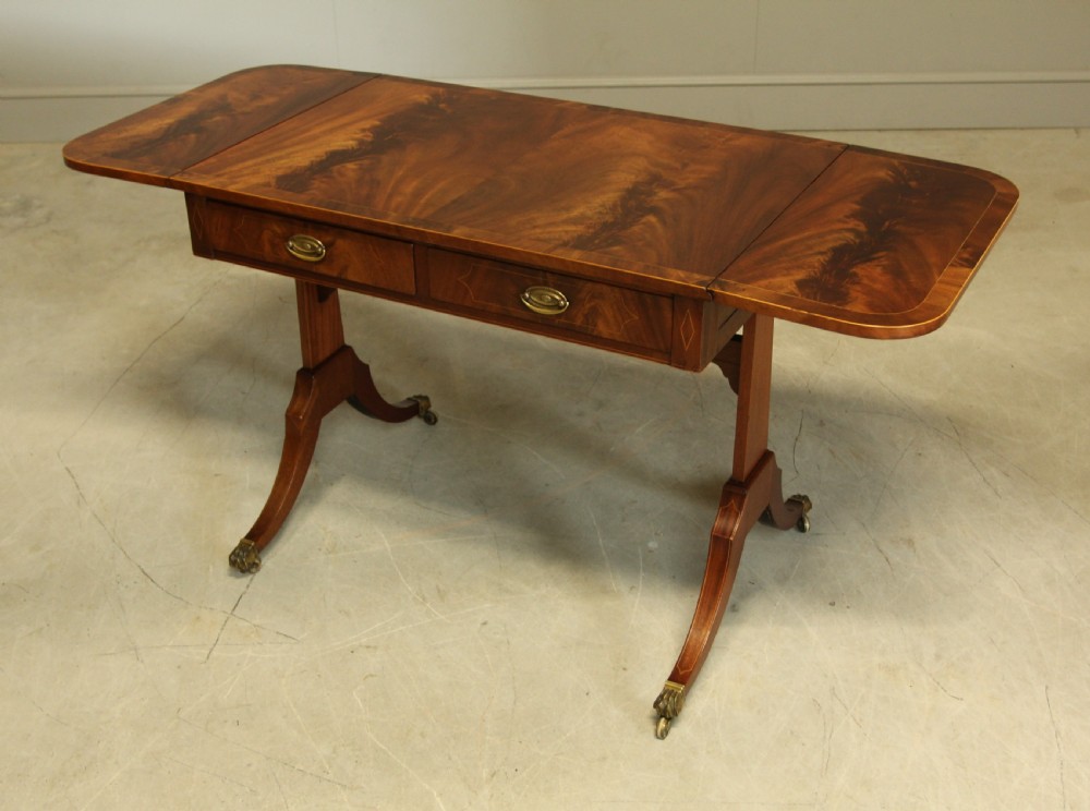 A 19th century curl mahogany sofa table View VII