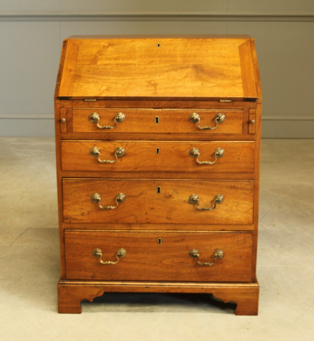A SMALL 18TH CENTURY CHESTNUT BUREAU.  View VI