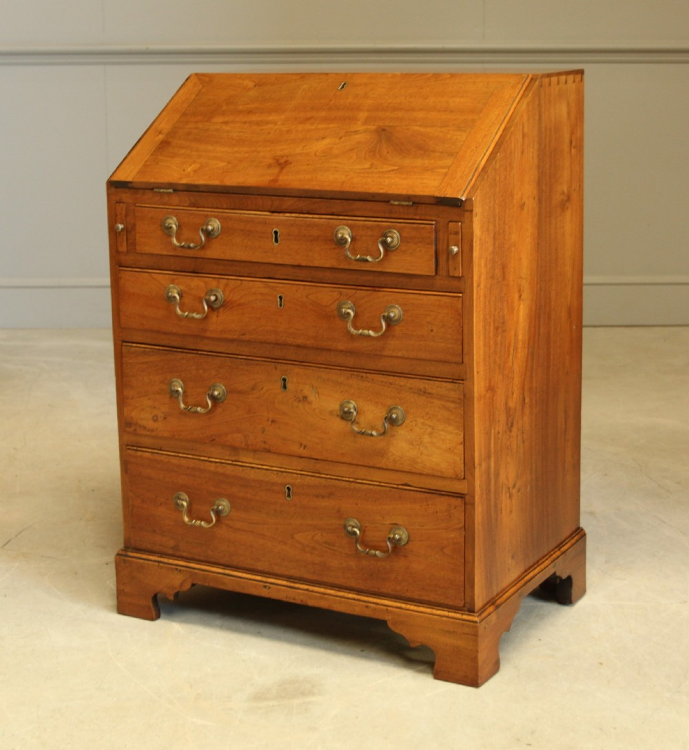 A SMALL 18TH CENTURY CHESTNUT BUREAU.  View VII