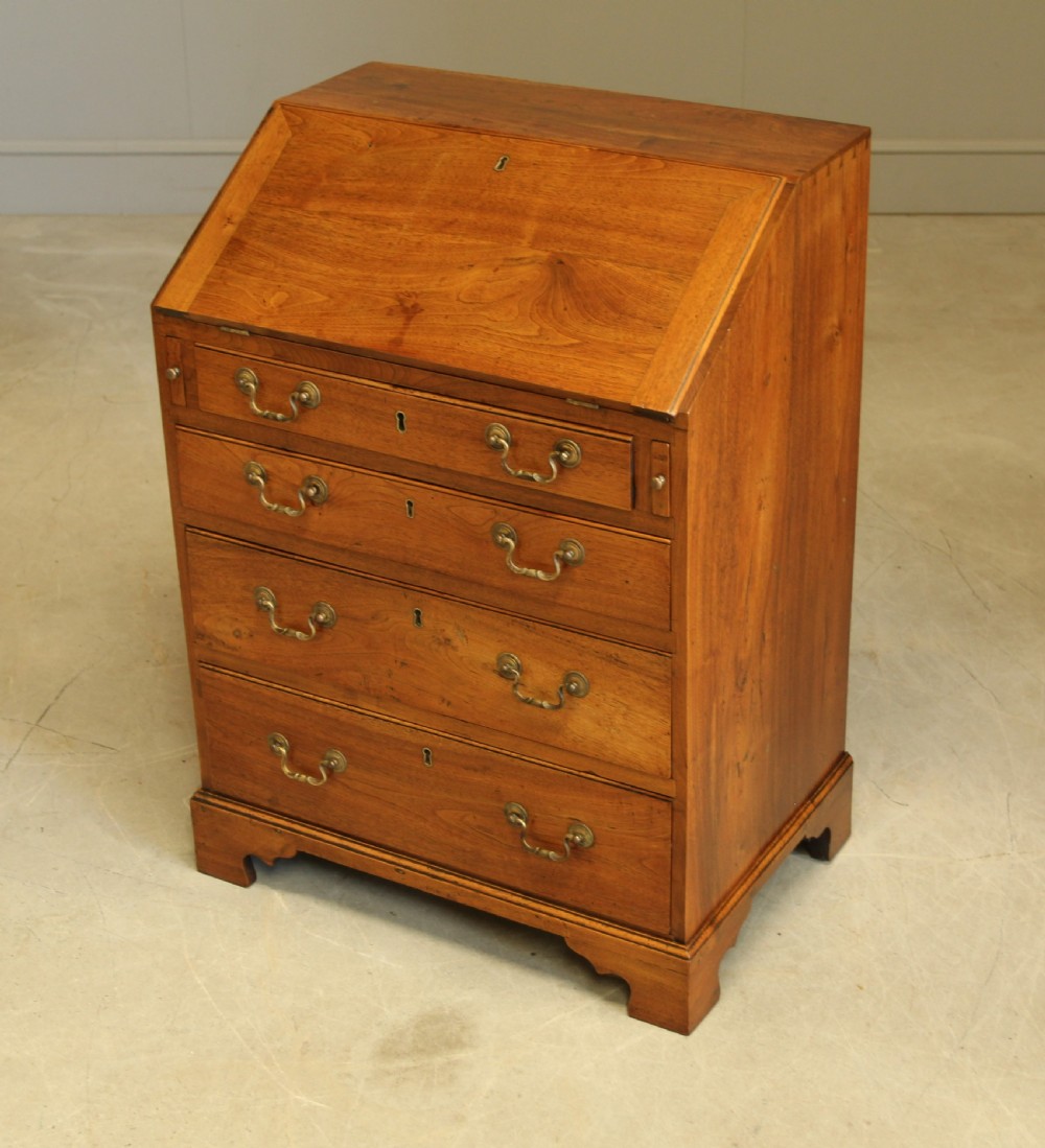 A SMALL 18TH CENTURY CHESTNUT BUREAU.  View VIII