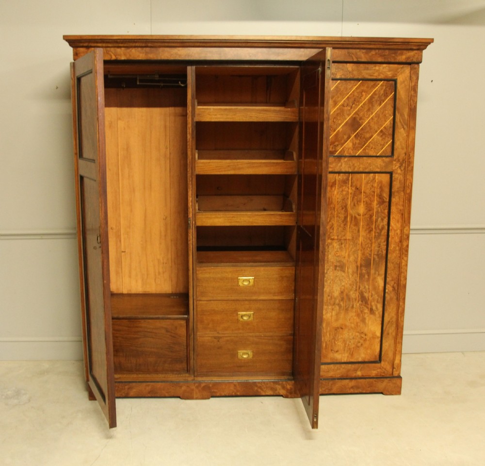 A VICTORIAN BURR WALNUT WARDROBE TRIPLE MIRRORED COMPACTUM. View IV