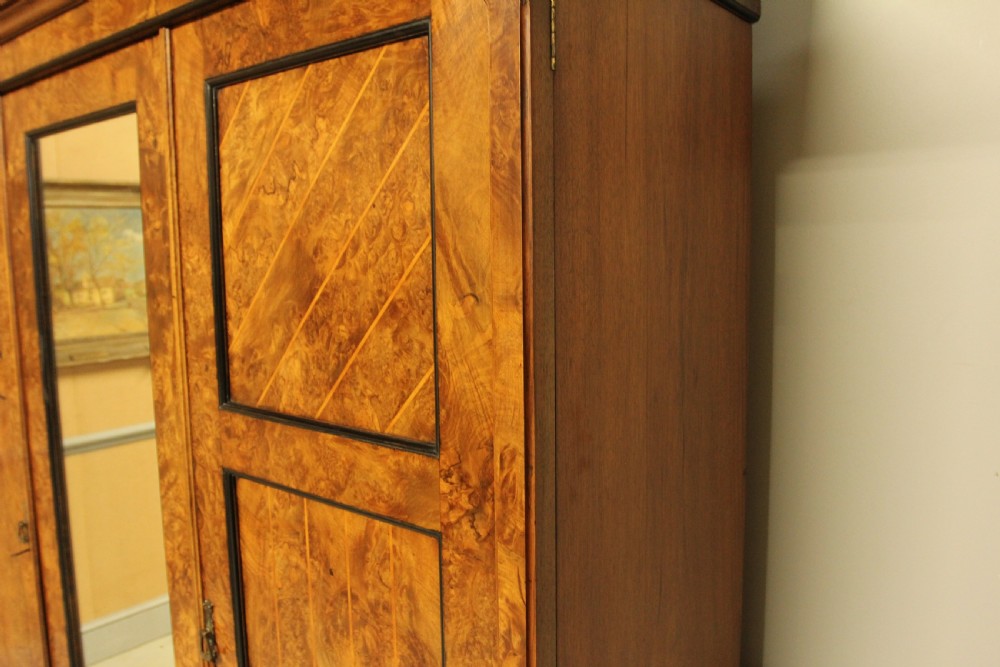 A VICTORIAN BURR WALNUT WARDROBE TRIPLE MIRRORED COMPACTUM. View IX