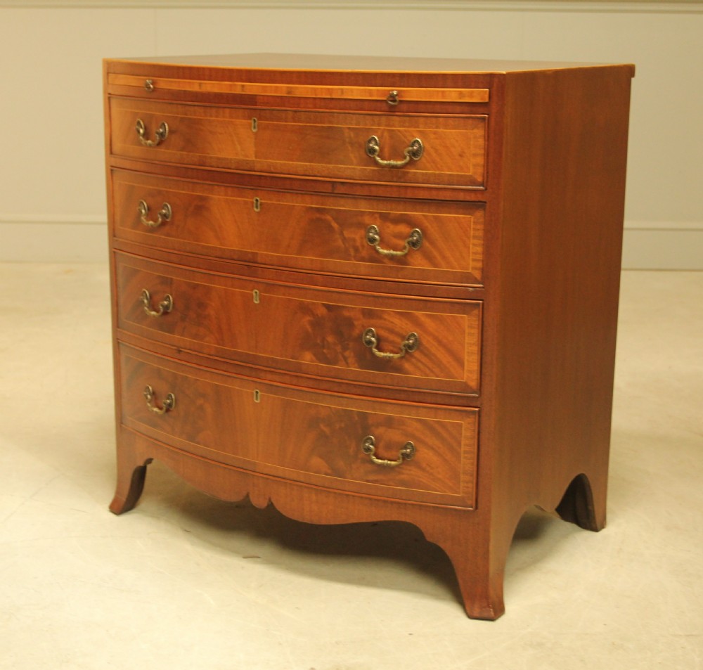 AN EARLY 20TH CENTURY MAHOGANY CHEST OF DRAWERS. View IV