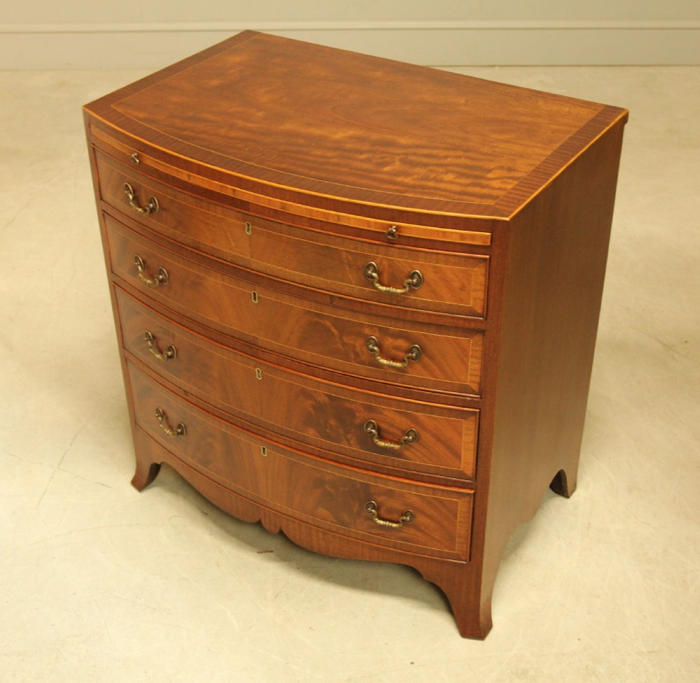 AN EARLY 20TH CENTURY MAHOGANY CHEST OF DRAWERS. View VII