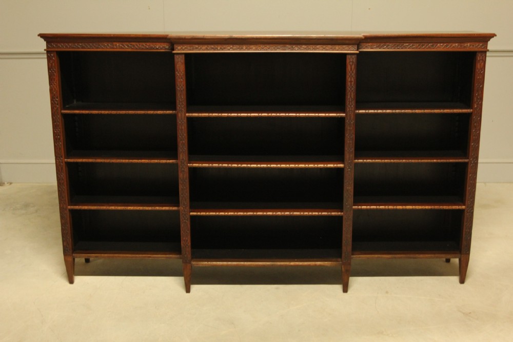 A early 20th century mahogany breakfront open bookcase.  View II
