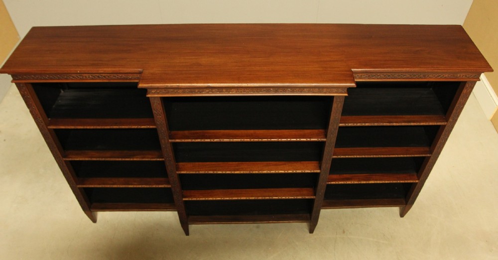 A early 20th century mahogany breakfront open bookcase.  View V