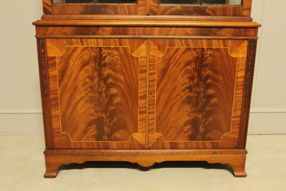 An early 20th-century mahogany glazed display cabinet. View VI