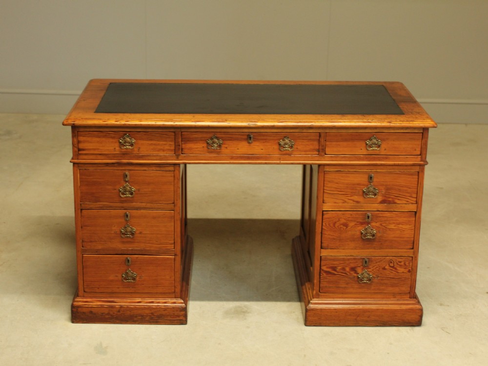 A Victorian Pitch Pine twin pedestal writing desk. View II