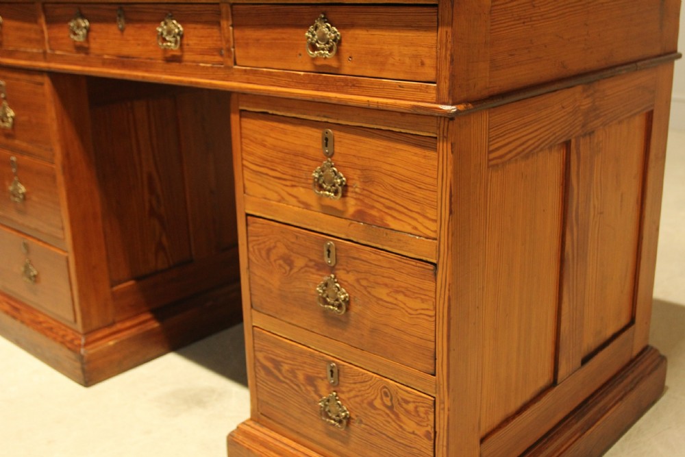 A Victorian Pitch Pine twin pedestal writing desk. View III