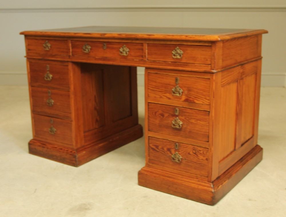 A Victorian Pitch Pine twin pedestal writing desk. View V