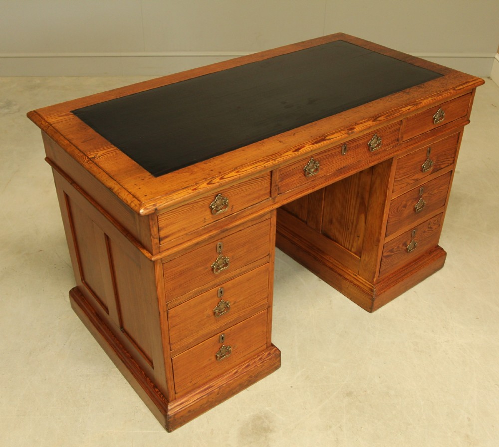 A Victorian Pitch Pine twin pedestal writing desk. View VI