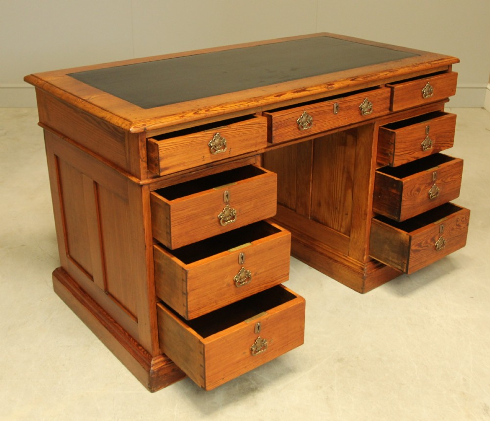 A Victorian Pitch Pine twin pedestal writing desk. View VIII