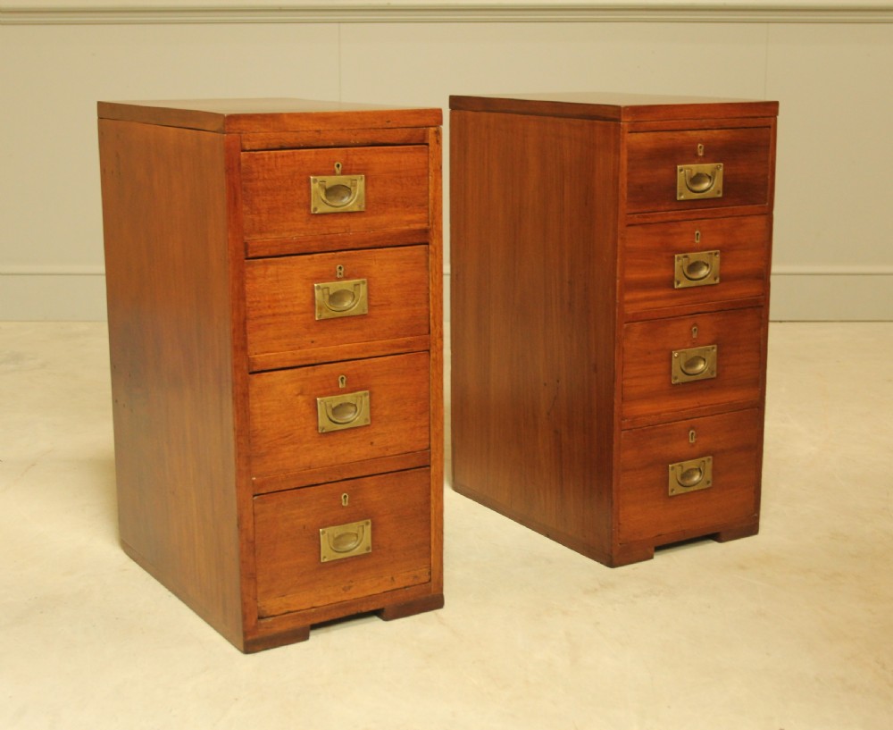 A PAIR OF MAHOGANY BEDSIDE CABINETS.