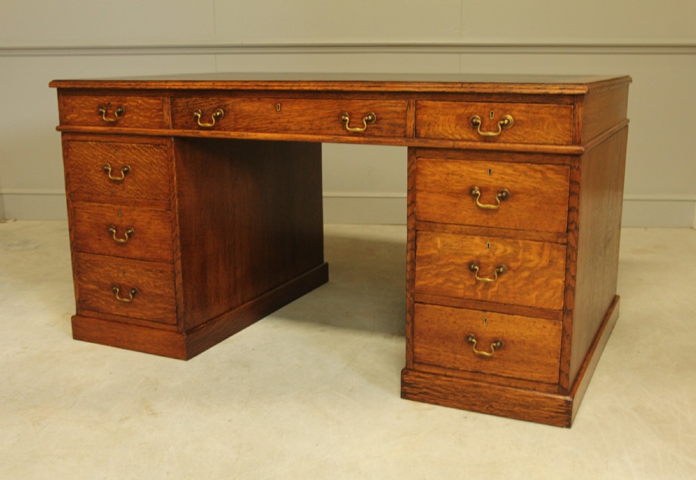 A LARGE EARLY 20TH CENTURY OAK TWIN PEDESTAL DESK  View IX