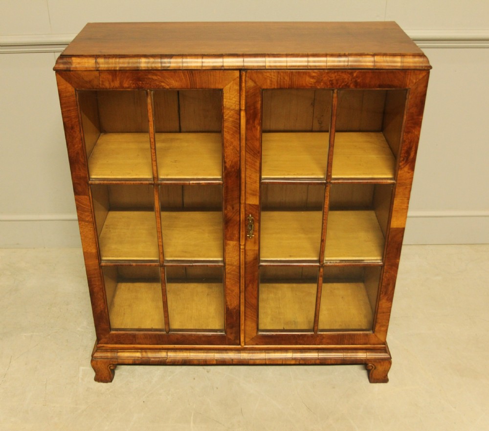 AN EARLY 20TH WALNUT DISPLAY BOOKCASE. View III