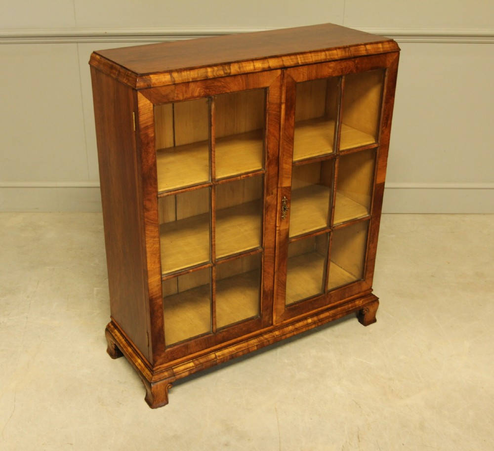 AN EARLY 20TH WALNUT DISPLAY BOOKCASE. View V