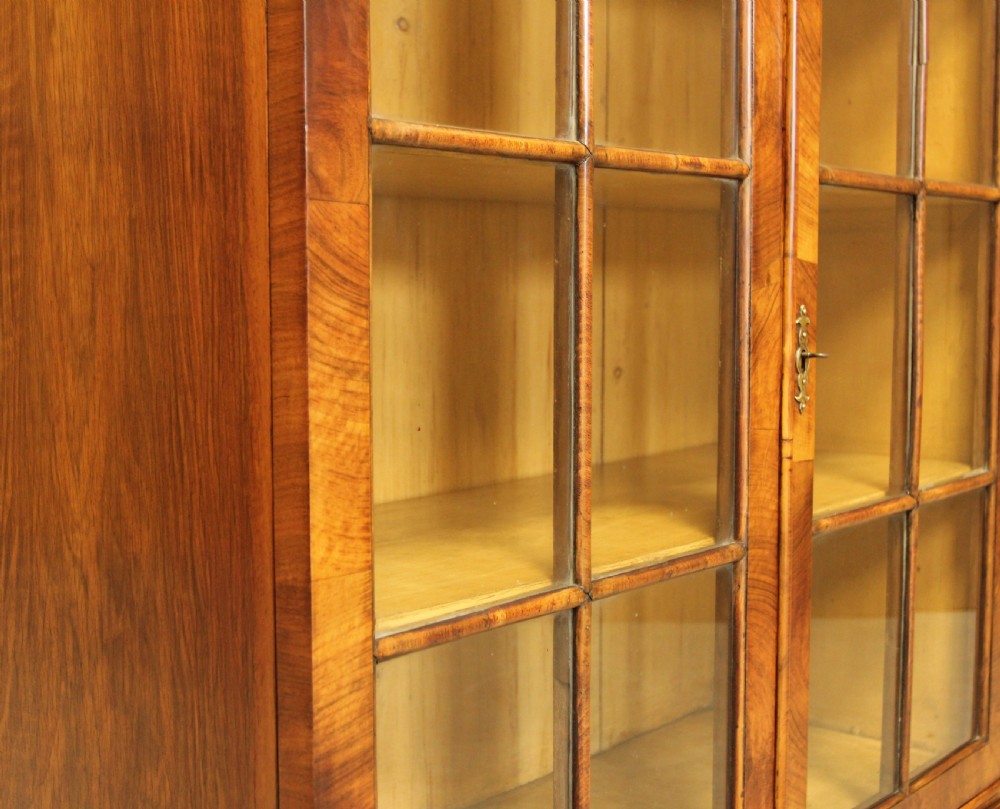 AN EARLY 20TH WALNUT DISPLAY BOOKCASE. View VIII