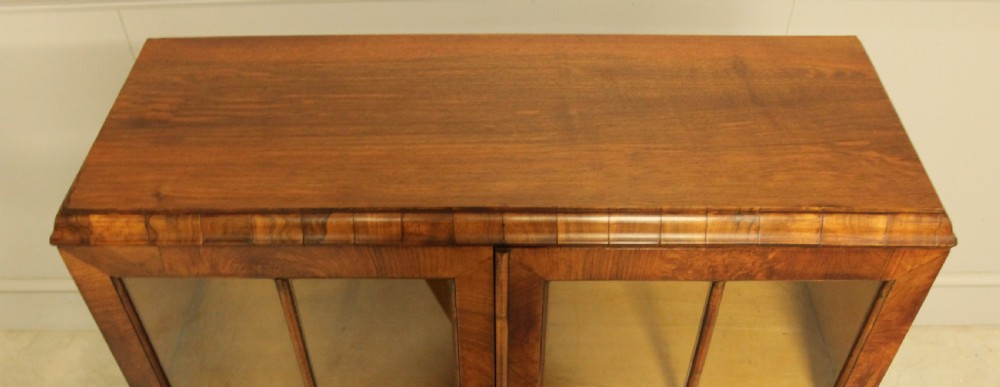 AN EARLY 20TH WALNUT DISPLAY BOOKCASE. View IX
