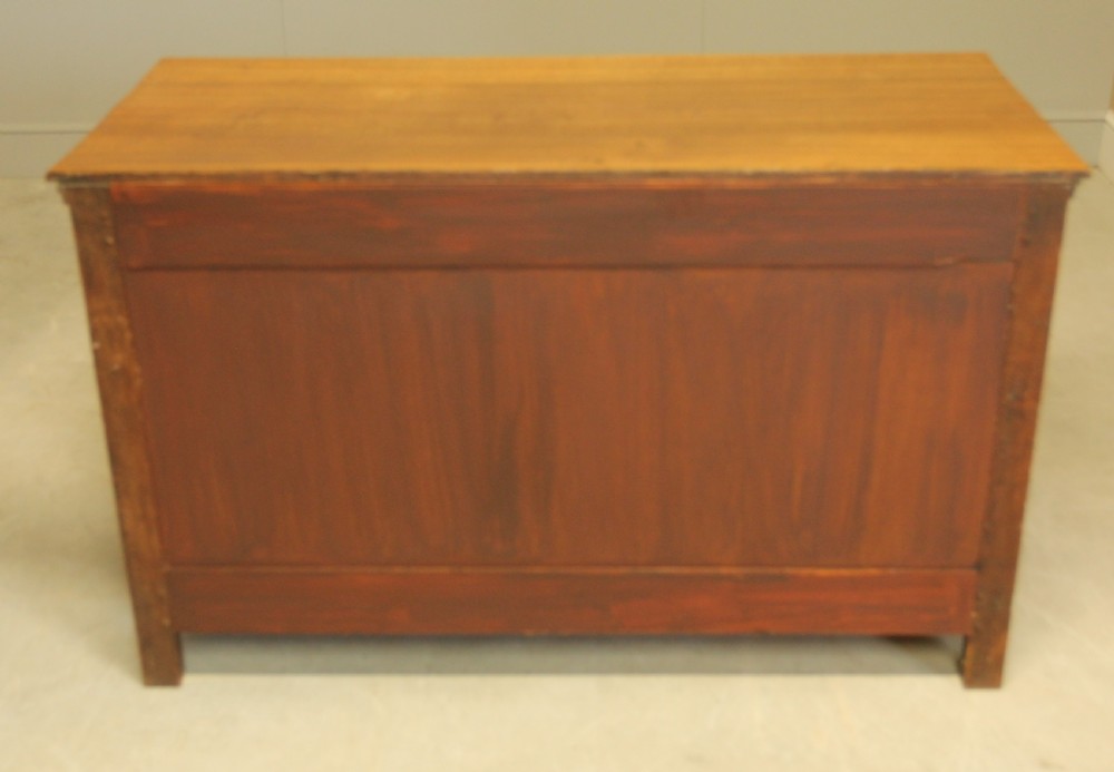 A 19TH CENTURY FRENCH OAK CHEST OF DRAWERS. View X