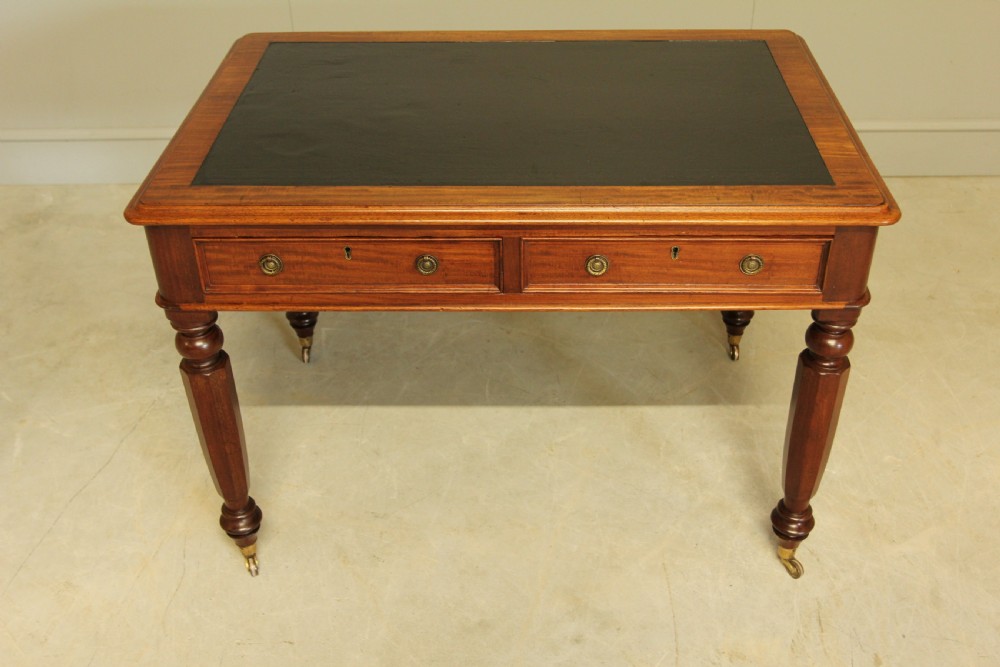 A Victorian mahogany writing table.  View V