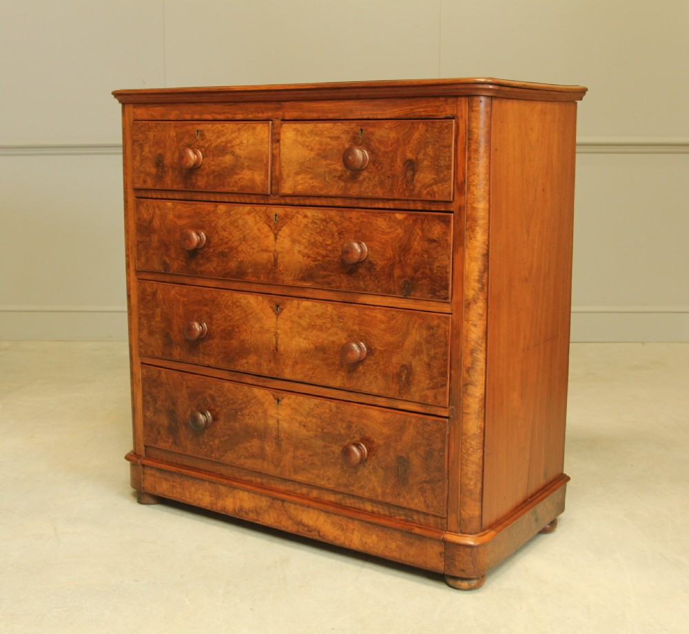 A VICTORIAN BURR WALNUT CHEST OF DRAWERS View IV
