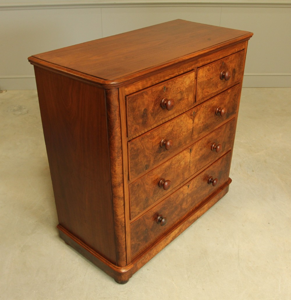 A VICTORIAN BURR WALNUT CHEST OF DRAWERS View V