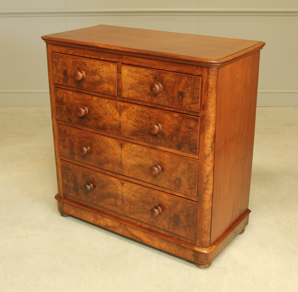 A VICTORIAN BURR WALNUT CHEST OF DRAWERS View VI