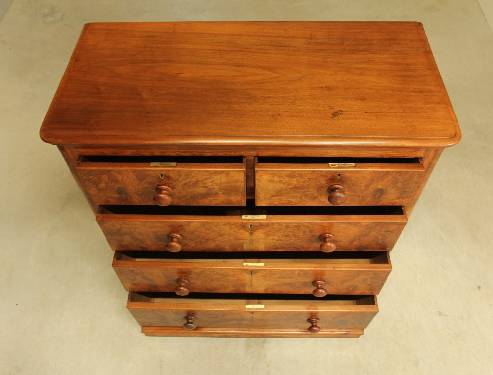 A VICTORIAN BURR WALNUT CHEST OF DRAWERS View IX