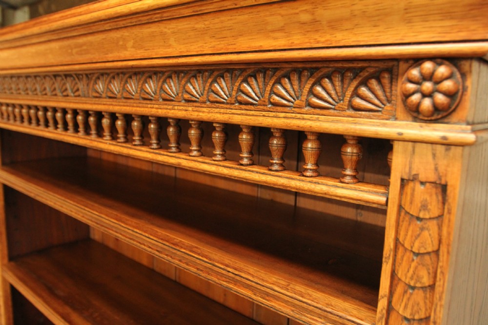 A VICTORIAN AESTHETIC OAK OPEN BOOKCASE. View VI