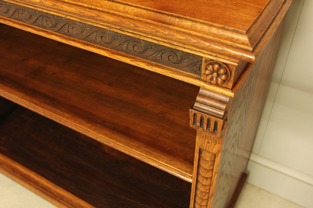A VICTORIAN AESTHETIC OAK OPEN BOOKCASE. View IX