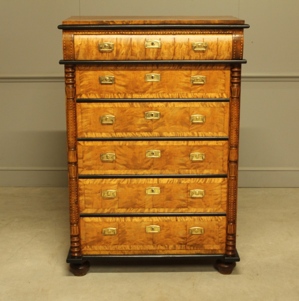 A 20TH CENTURY SWEDISH BIRCH CHEST OF DRAWERS. View II