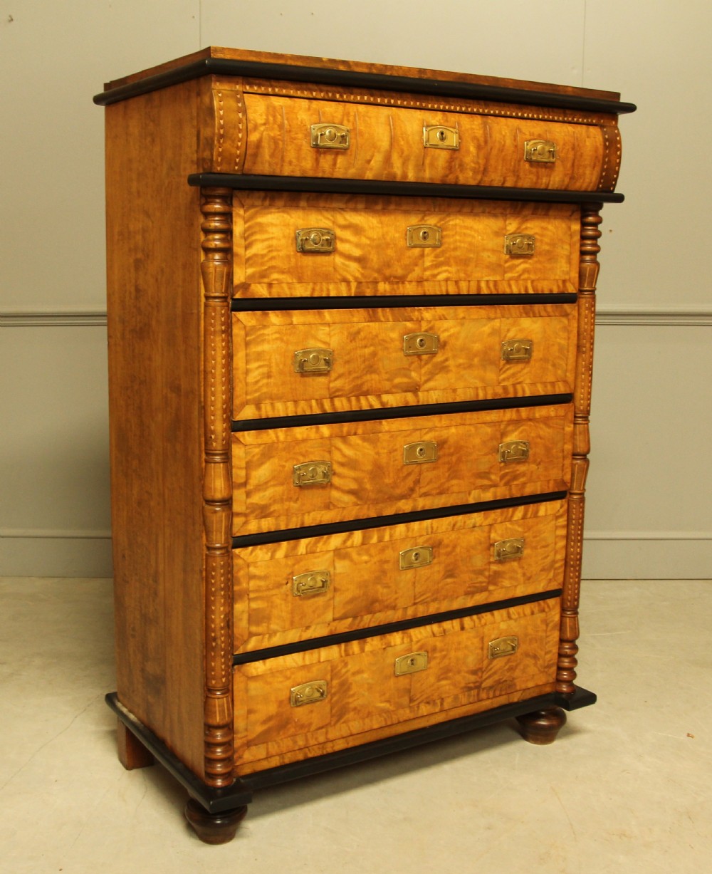 A 20TH CENTURY SWEDISH BIRCH CHEST OF DRAWERS. View III