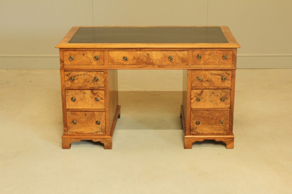 A VICTORIAN BURR WALNUT WRITING DESK.