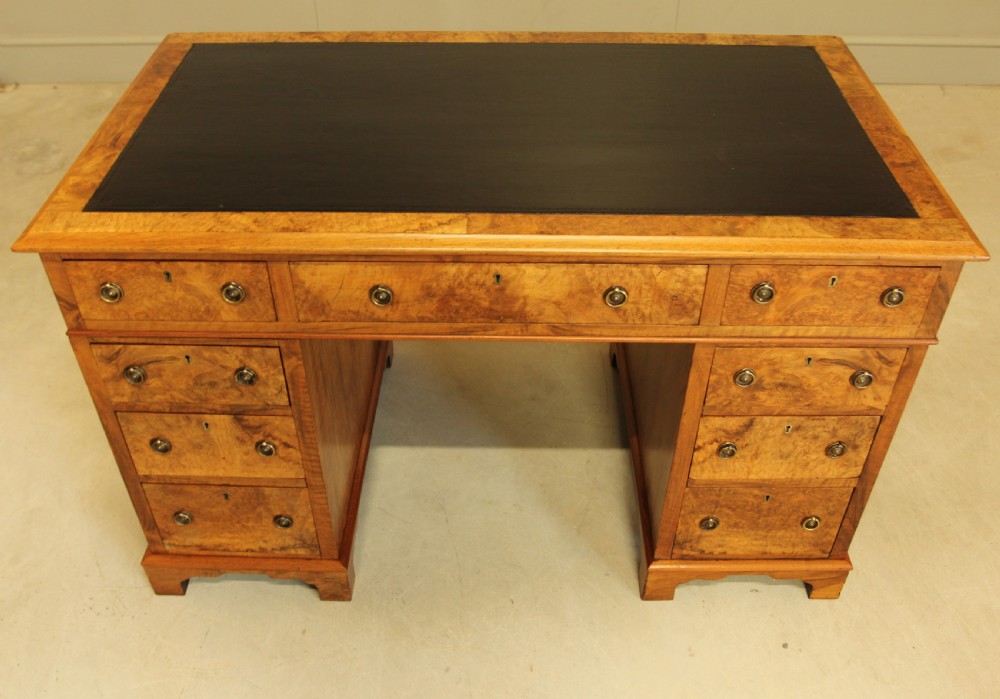 A VICTORIAN BURR WALNUT WRITING DESK. View IV