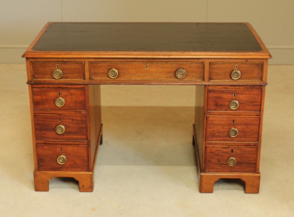 A GEORGIAN MAHOGANY TWIN PEDESTAL DESK View II