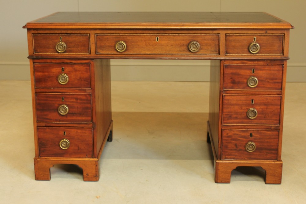 A GEORGIAN MAHOGANY TWIN PEDESTAL DESK View III