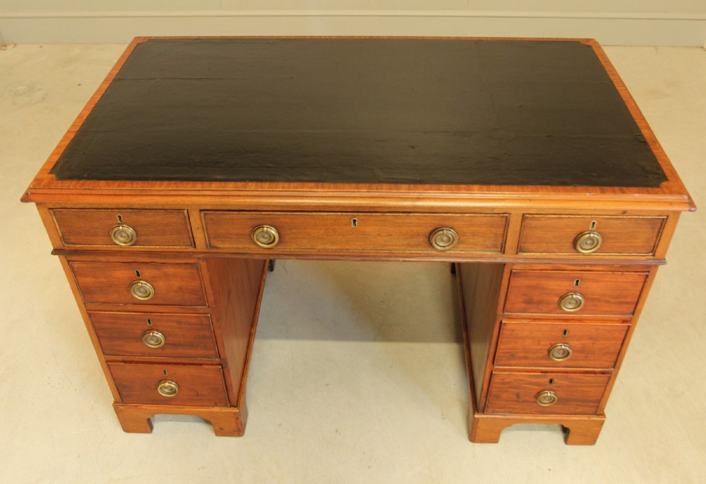 A GEORGIAN MAHOGANY TWIN PEDESTAL DESK View V