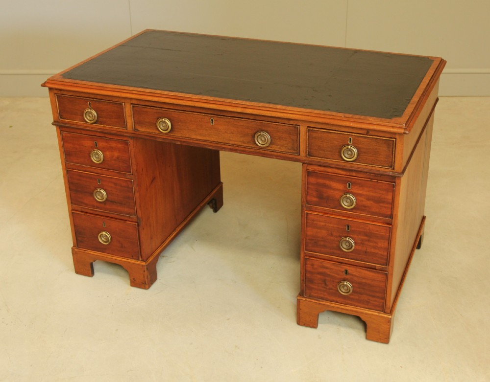 A GEORGIAN MAHOGANY TWIN PEDESTAL DESK View VII