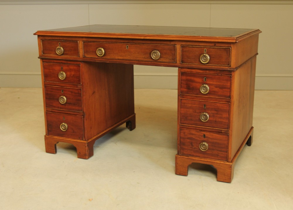 A GEORGIAN MAHOGANY TWIN PEDESTAL DESK View VIII