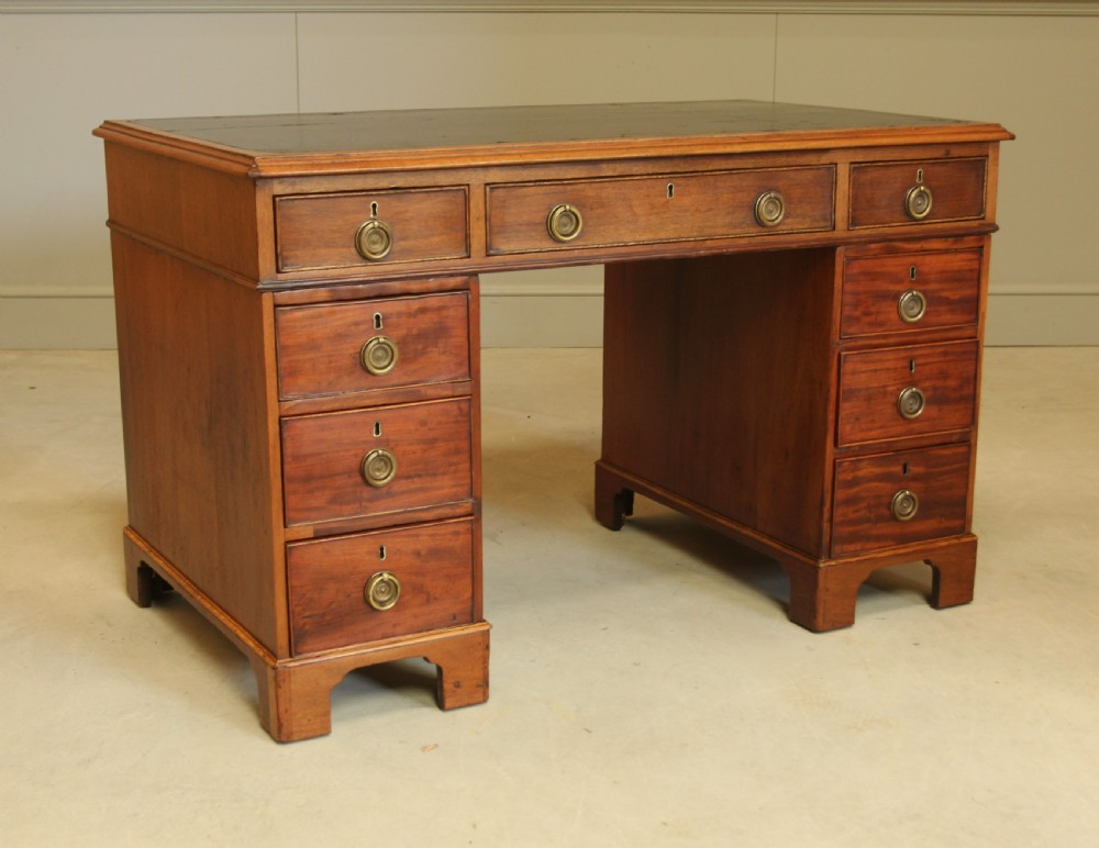 A GEORGIAN MAHOGANY TWIN PEDESTAL DESK View IX