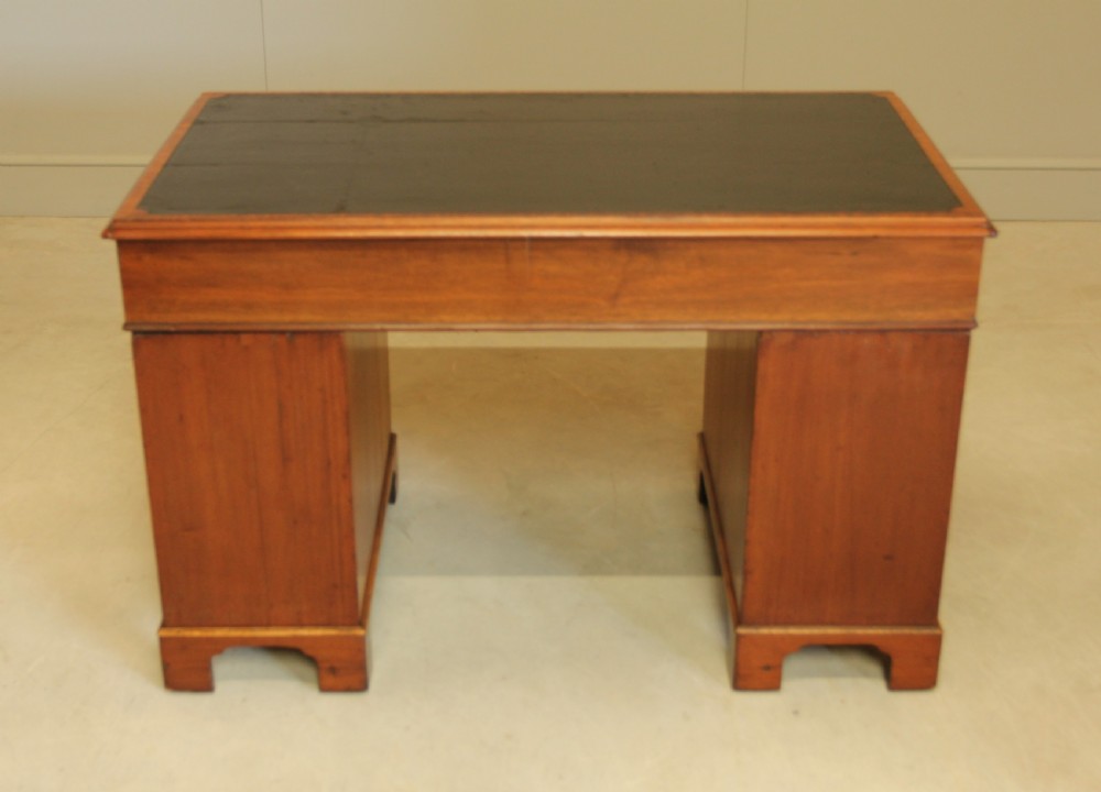 A GEORGIAN MAHOGANY TWIN PEDESTAL DESK View XII