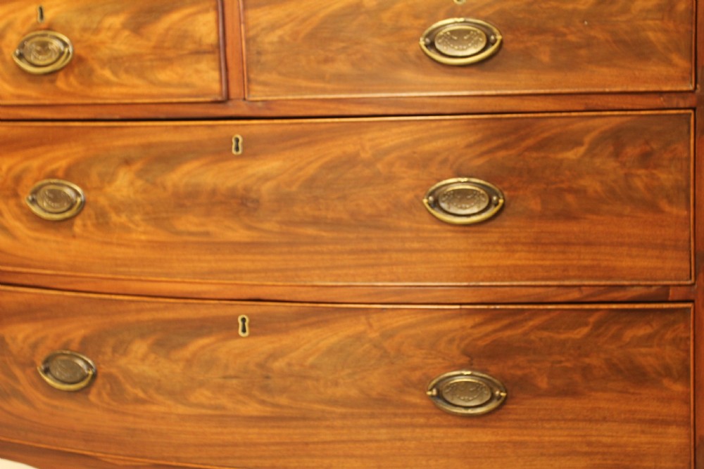 A REGENCY MAHOGANY BOW FRONTED CHEST OF DRAWERS. View VI