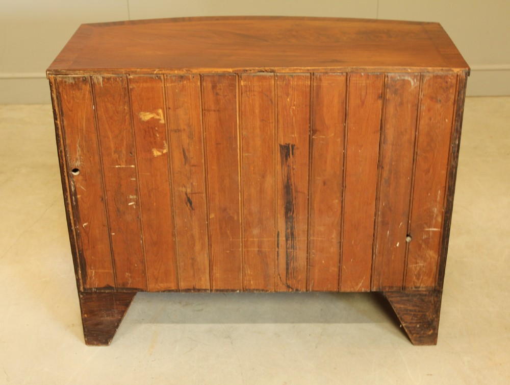 A REGENCY MAHOGANY BOW FRONTED CHEST OF DRAWERS. View XII