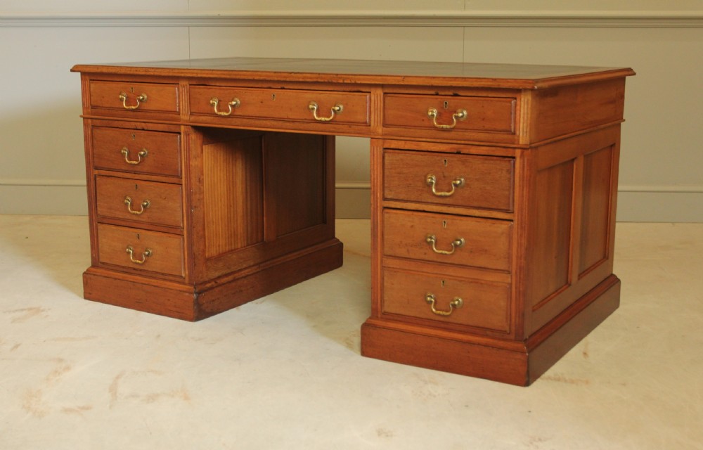 A LARGE EARLY 20TH MAHOAGANY WRITING DESK.  View VIII